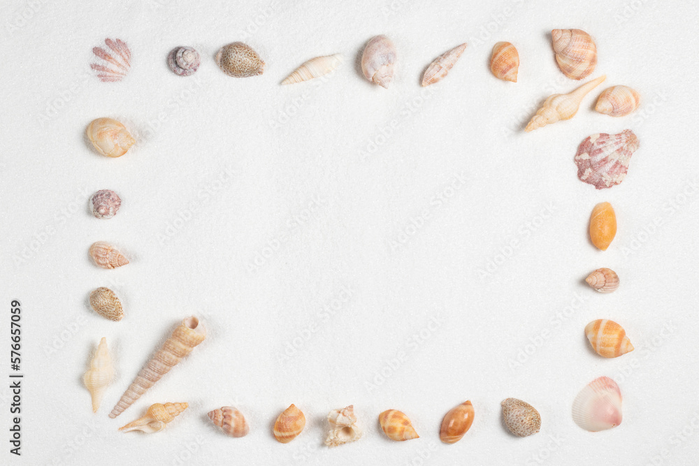 Frame of sea shells on sandy beach. Frame of sea shells on sandy beach.
