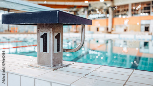 Swimming-Pool with equipment and large windows with a view outside