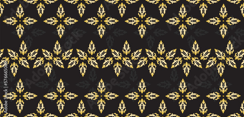 Indonesian traditional batik patterns from Riau, Malaysia, Malay traditional design culture Melayu on black fabric Background, gold threads

