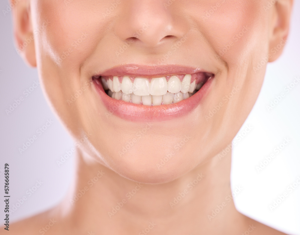 Obraz premium Teeth, dental and oral hygiene with a model woman in studio on a gray background for tooth whitening. Dentist, healthcare and veneers with a female indoor to show a happy smile at a mouth specialist