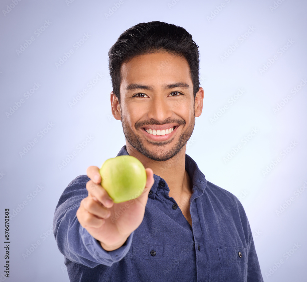 Portrait of happy man with apple isolated on studio background healthy diet, healthcare or nutritionist breakfast. Vegan person or asian model with green fruit or food for dietician care and choice Portrait of happy man with apple isolated on studio background healthy diet, healthcare or nutritionist breakfast. Vegan person or asian model with green fruit or food for dietician care and choice