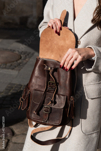 photo of a brown, retro look leather backpack