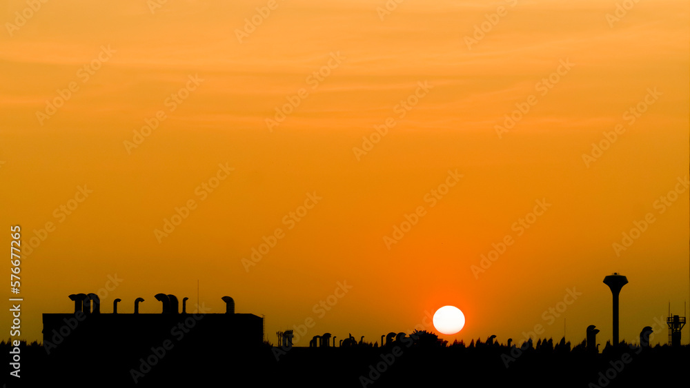 sunset, silhouette of industrial city