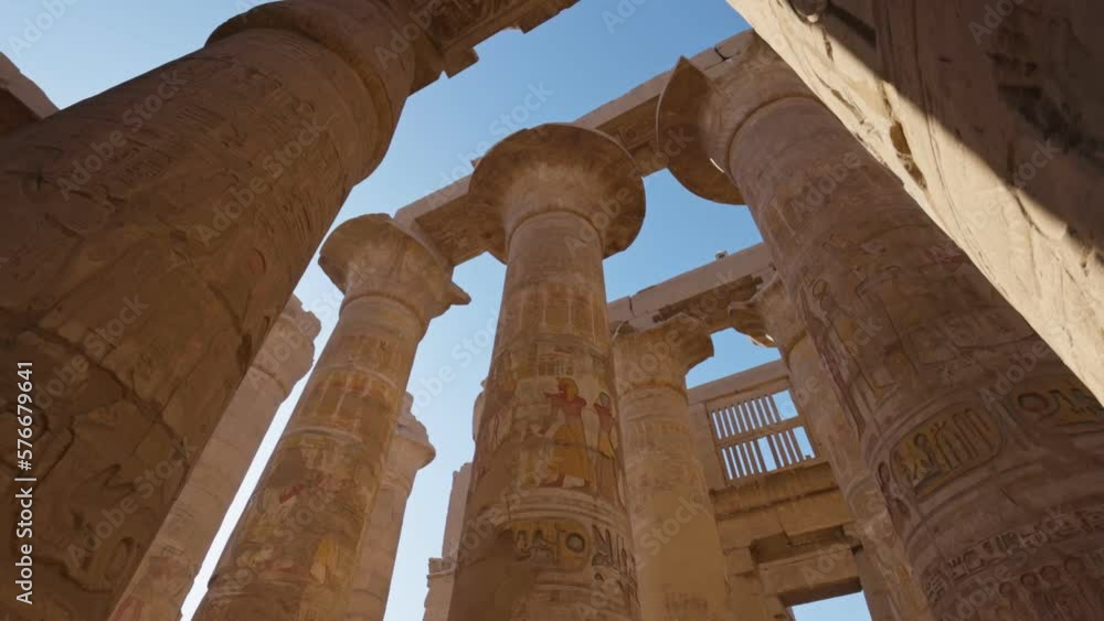 Karnak Temple in Luxor, Egypt. Camera moves between majestic columns