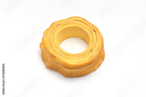 Isolated baumkuchen, Sakotis ,sekacz pie, traditional spit cake in lithuanian, polish, german, belarusian cuisine on white background Horizontal plane. Copy space, top view photo