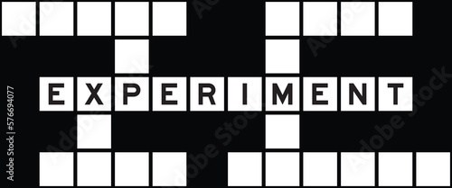 Alphabet letter in word experiment on crossword puzzle background
