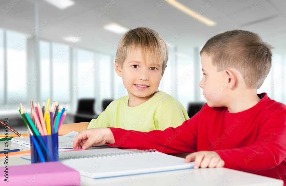 Happy young school children study Happy young school children study