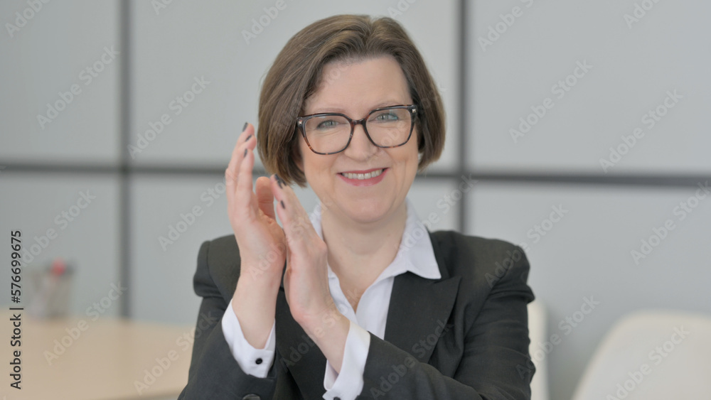 Portrait of Old Businesswoman Clapping in Appreciation Portrait of Old Businesswoman Clapping in Appreciation
