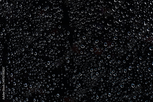 Water drops closeup, black background