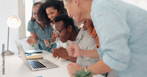 Winner, teamwork and business people with laptop in celebration for stock trading bonus, profit and sales. Support, motivation and excited group of workers high five, applause and winning in office