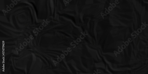 Dark Black facbric paper backdrop crumpled texture. dark black textured crumpled black paper background. panorama black paper texture background, crumpled pattern. © MdLothfor