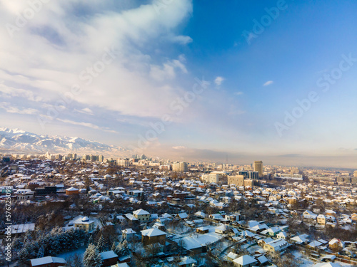 Panorama of the city of Almaty from a height in winter. © Сергей Дудиков