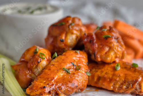 delicious chicken wings in spicy buffalo bbq sauce