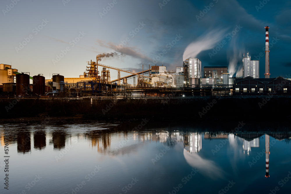 Chemical plant by river, Day to night transition