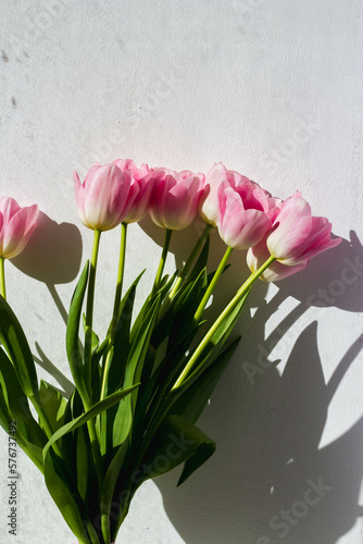 Fototapeta Naklejka Na Ścianę i Meble -  Bouquet of pink tulips, top view, spring bouquet.