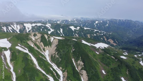 Beautiful mountain landscape of Vilyuchinsky Pass at sunny day. Kamchatka Peninsula, Russia photo