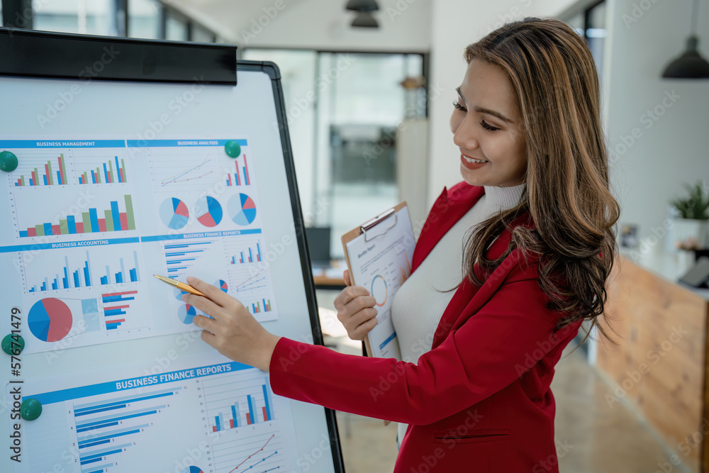 Portrait young business woman presentation marketing profit with confident within investment and seminar for planning of finance Portrait young business woman presentation marketing profit with confident within investment and seminar for planning of finance