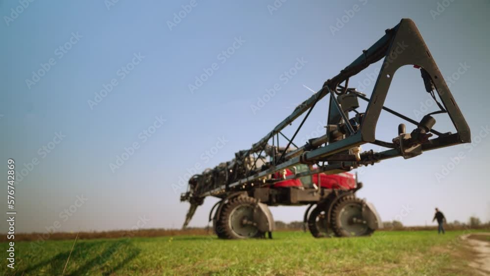 The agronomist goes to his tractor. field. fertilization. The agronomist goes to his tractor. field. fertilization.