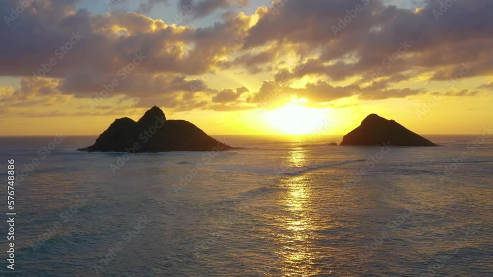 Aerial view of the Mokulua Islands at sunset, Kailua Bay, Oahu, Hawaii, United States. Aerial view of the Mokulua Islands at sunset, Kailua Bay, Oahu, Hawaii, United States.
