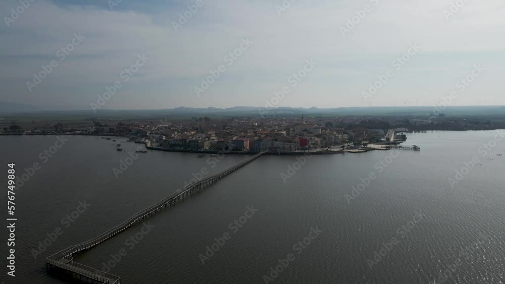 Aerial view of Lesina, a small town along Lesina Lake on Gargano natural park, Foggia, Puglia, Italy. Aerial view of Lesina, a small town along Lesina Lake on Gargano natural park, Foggia, Puglia, Italy.