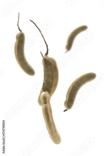 Raw tamarind flying isolated on a white background photo