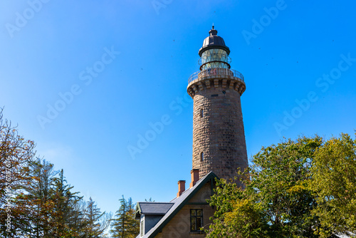 Lighthouse from the ground with blue sky from Denmark Lodbjerg Fyr photo