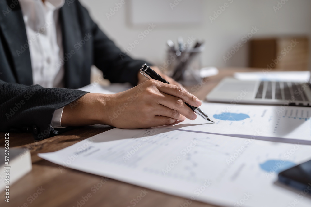 Fototapeta premium Business investor analyzing a valuation data forecast a investment project..