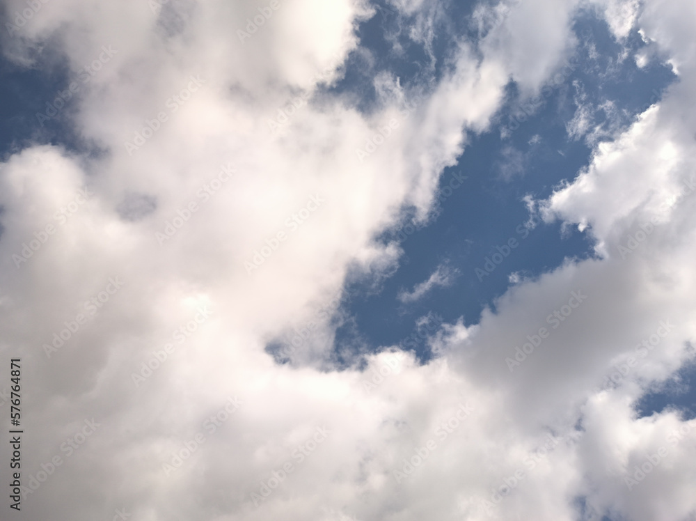 Abstract rare giant cloud in the sky. It looks like a woman offering something to whatever in heaven Abstract rare giant cloud in the sky. It looks like a woman offering something to whatever in heaven