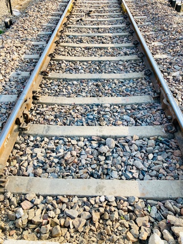 Indian people crossing railway track in mumbai
