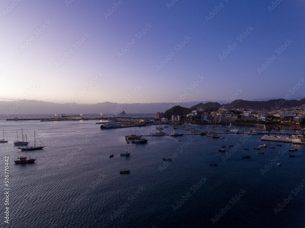 Mindelo is a picturesque city located on the island of São Vicente in Cape Verde, with stunning landscapes. It has a beautiful harbor, sandy beaches, a rugged coastline, and a mountainous backdrop. Mindelo is a picturesque city located on the island of São Vicente in Cape Verde, with stunning landscapes. It has a beautiful harbor, sandy beaches, a rugged coastline, and a mountainous backdrop.