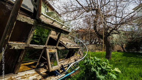 Abandoned furniture and boat building photo