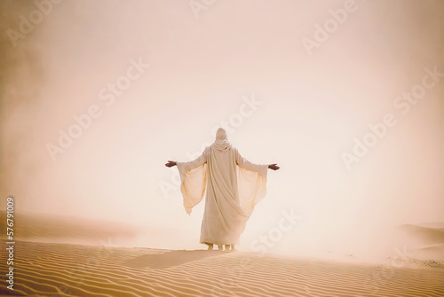 Man in coat stand in a desert sands during the storm, raising hands in praying gesture. Dusty mist. Generative AI