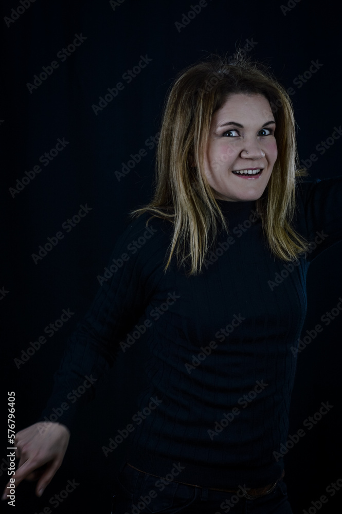 portrait of a beautiful blonde having fun while dancing portrait of a beautiful blonde having fun while dancing