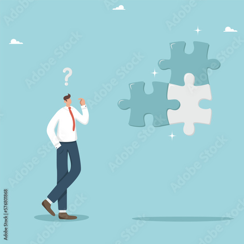 Thinking, thought process, gaining knowledge, finding ways to solve a complex problem, creating a strategy or a long-term plan for the development of a new business, a businessman solves a puzzle.