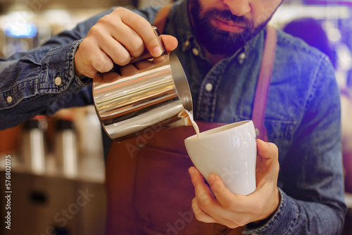 Making coffee in a coffee shop on a coffee machine