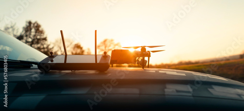A drone, UAV technologies in the rays of the sun outdoors. © Zhanna