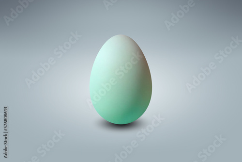 green Egg on a light blue floor