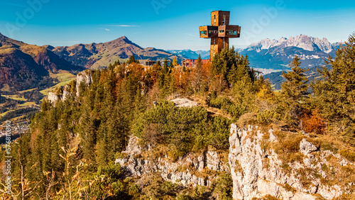 Beautiful alpine autumn or indian summer view at the famous Buchensteinwand summit, St. Jakob in Haus, Tyrol, Austria photo