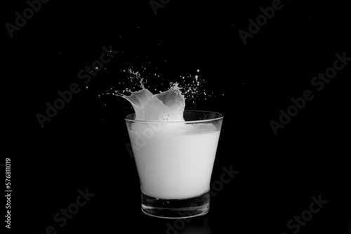 Splashes of milk on a black background