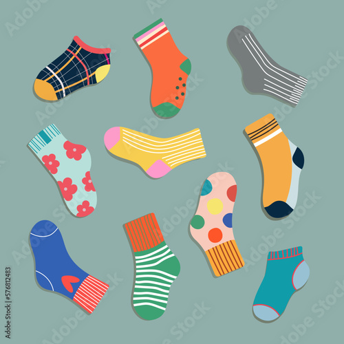 Set of trendy colorful socks. Modern socks in different colours top down view. Cartoony design for web and print.