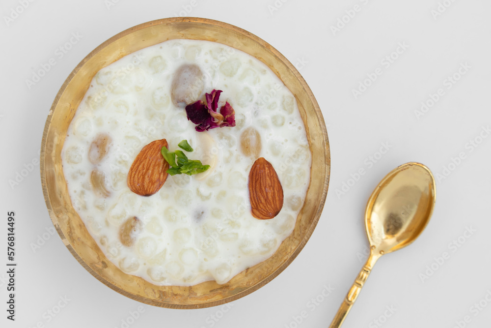 Indian Fasting Food Sabudana Kheer, Sagudana Khir Or Sago Seed Pudding Is Creamy Luscious Sweet Made Of Tapioca Pearls Soaked In Milk And Flavored With Dry Fruits. Enjoyed On Diwali Puja, Navaratra Indian Fasting Food Sabudana Kheer, Sagudana Khir Or Sago Seed Pudding Is Creamy Luscious Sweet Made Of Tapioca Pearls Soaked In Milk And Flavored With Dry Fruits. Enjoyed On Diwali Puja, Navaratra