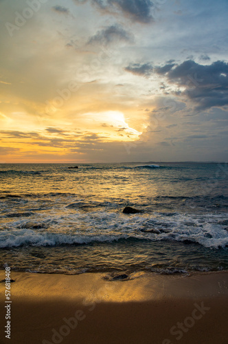 Beautiful tropical sunset on the sandy coast