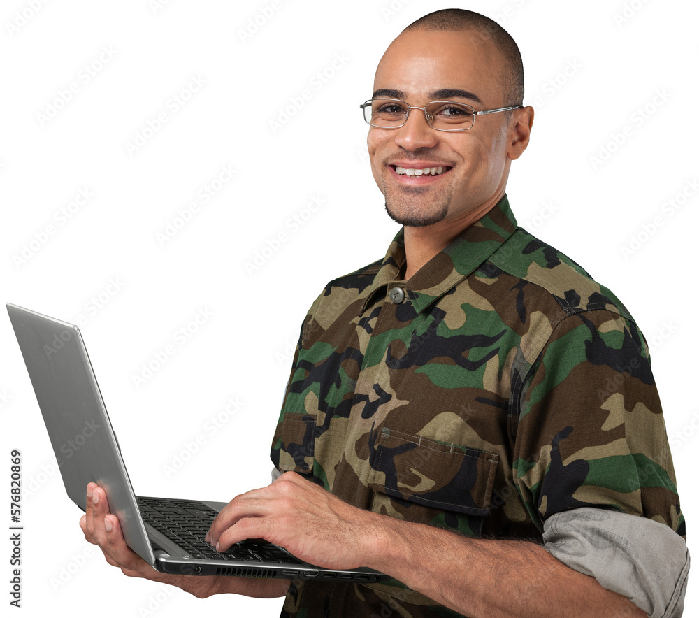 © BillionPhotos.com - Military veteran using laptop isolated on white background