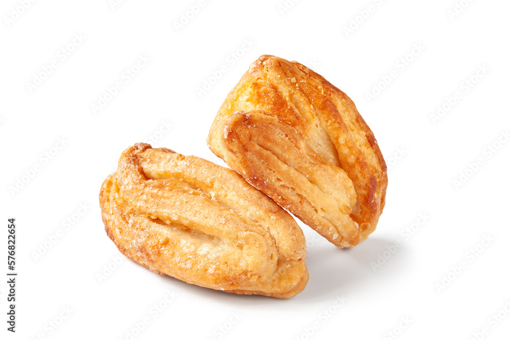 Cookies isolated on white. Biscuits are sprinkled with sugar. Crispy soft pastry