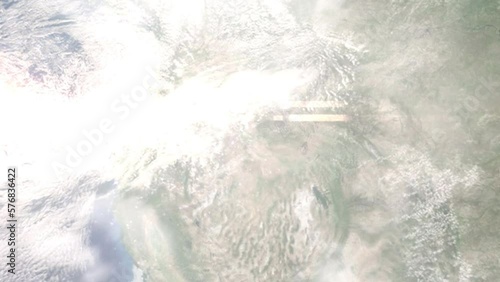 Earth zoom in from outer space to city. Zooming on Nampa, Idaho, USA. The animation continues by zoom out through clouds and atmosphere into space. Images from NASA