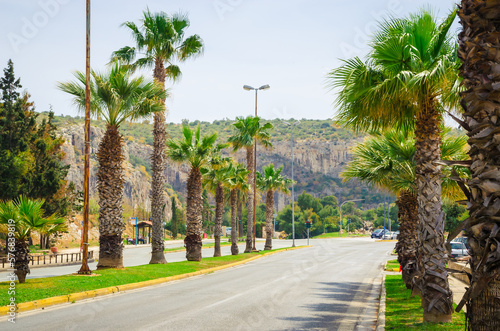 Fototapeta Naklejka Na Ścianę i Meble -  Beautiful highway with palms in Athens, Greece.