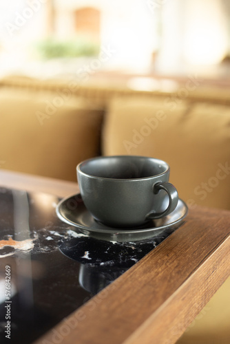 Fototapeta Naklejka Na Ścianę i Meble -  cup of coffee on a table