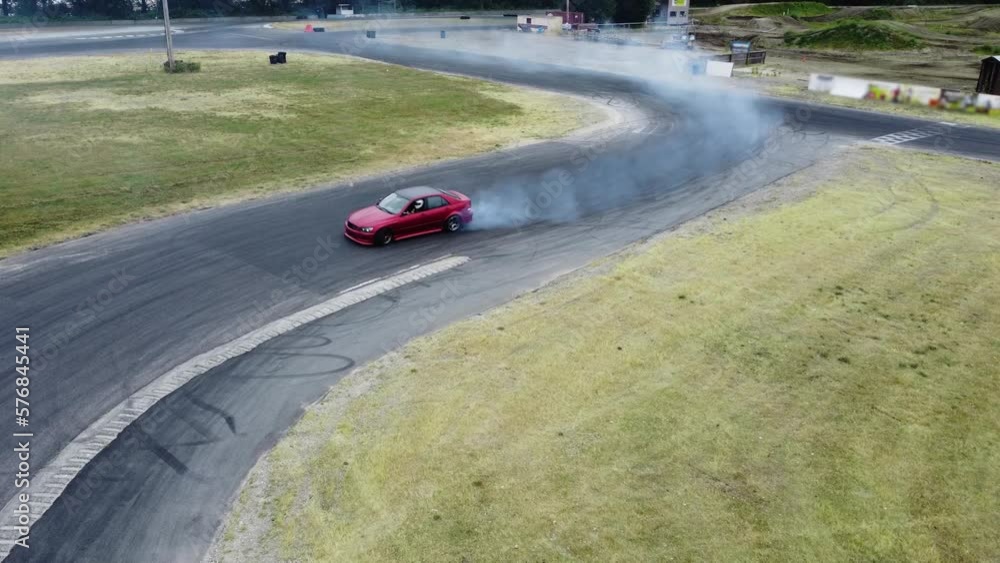 Vidéo Stock Red Drift Car / Race car drifting around corner very fast
