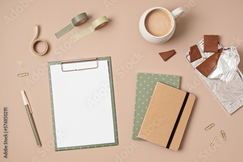 Mockup of clipboard and office supplies with white page copy space for your text. Flat lay, top view photo mock up