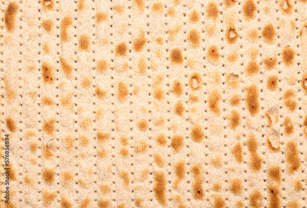 Jewish flatbread matza for Passover as background, closeup